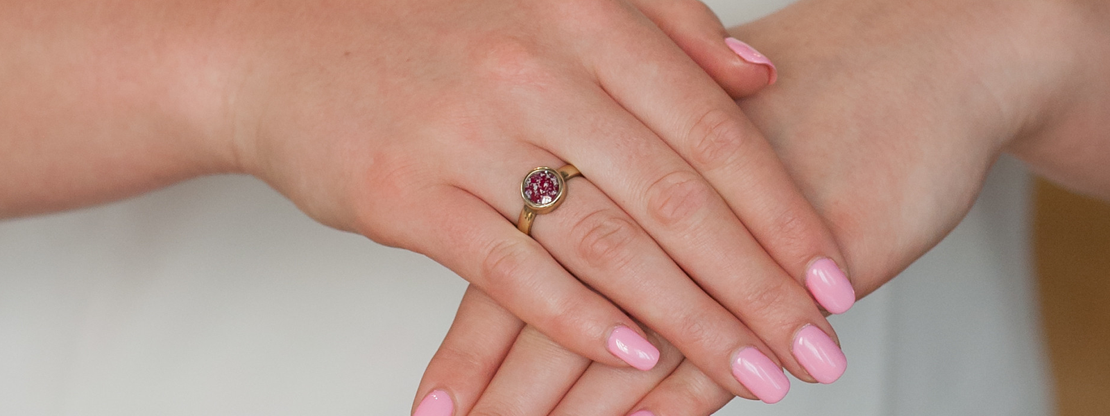 Glass ring containing cremated remains