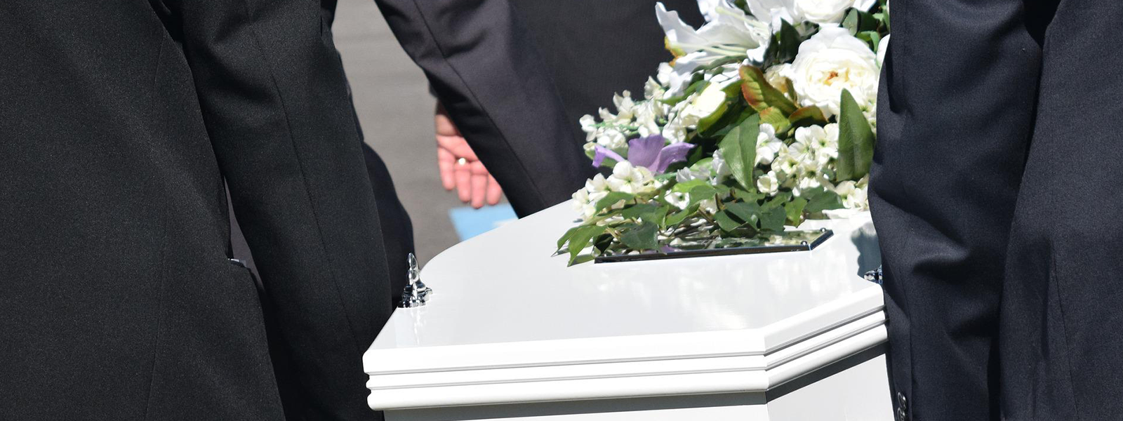 Pall Bearers carrying coffin