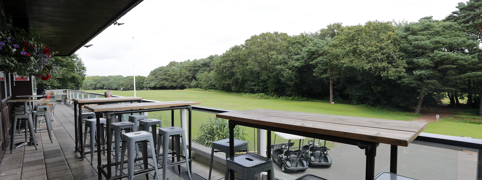 The balcony at Woodpecker Cafe, Queens Park overlooking the first tee