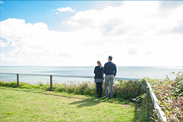 Couple looking to sea