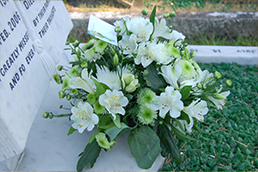 A floral tribute from a florist on a grave