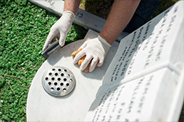 Cleaning a memorial headstone